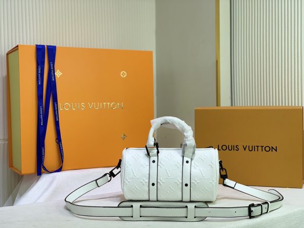 Replica LV Keepall XS in Monogram Seal Design - Image 11
