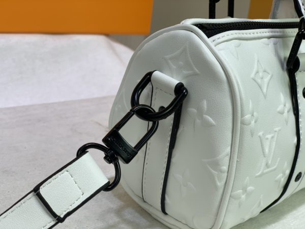 Replica LV Keepall XS in Monogram Seal Design - Image 13
